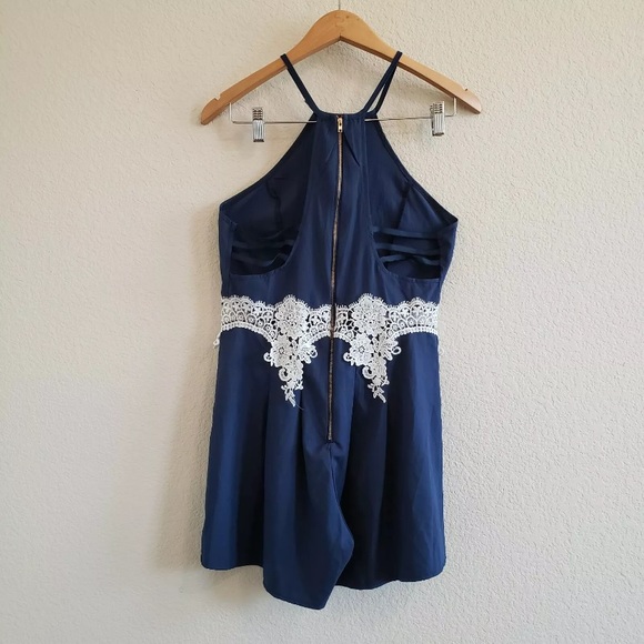 Navy romper with open sides and lace midriff - Picture 3 of 6
